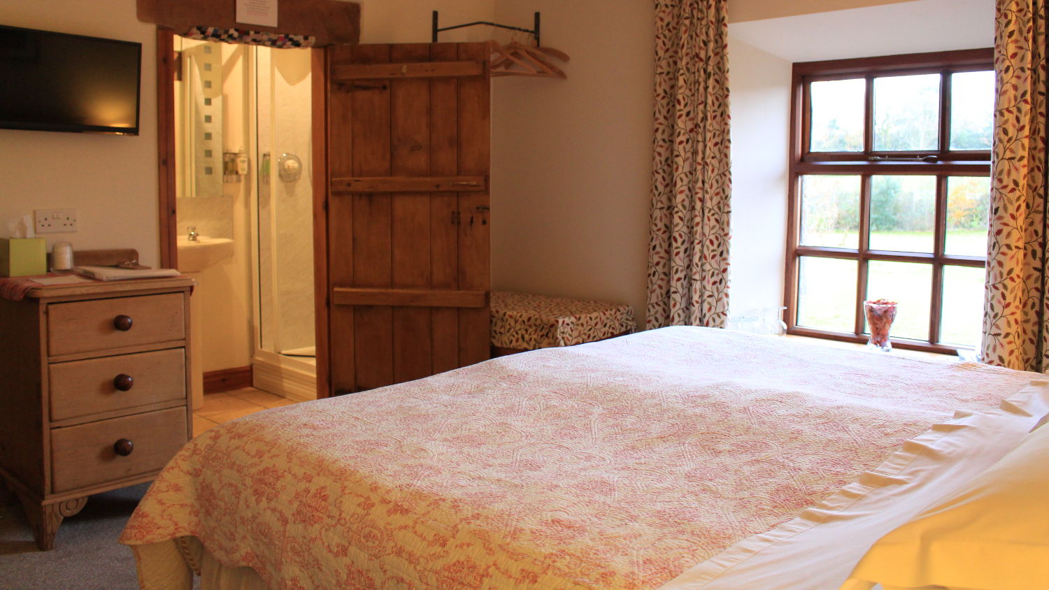 View of double bed in sunlight