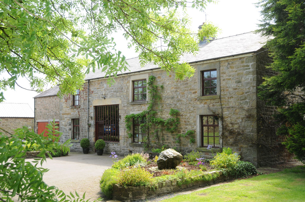 A photo of the front of the farmhouse